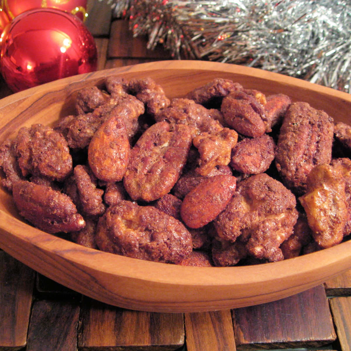 Holiday spiced nuts in wooden bowl