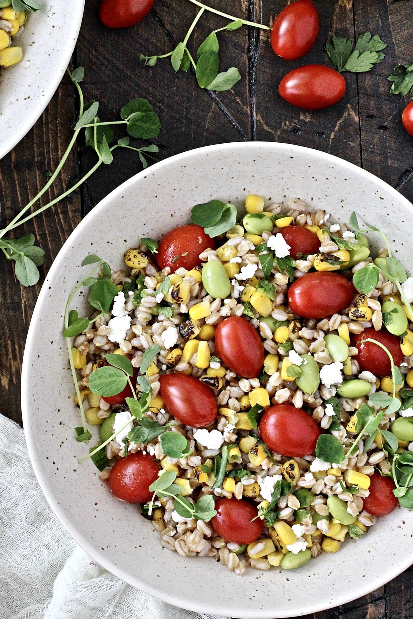 Everything you need to know about whole grains along with the recipe for this healthy and flavorful Farro Salad with Corn, Tomatoes and Edamame.
