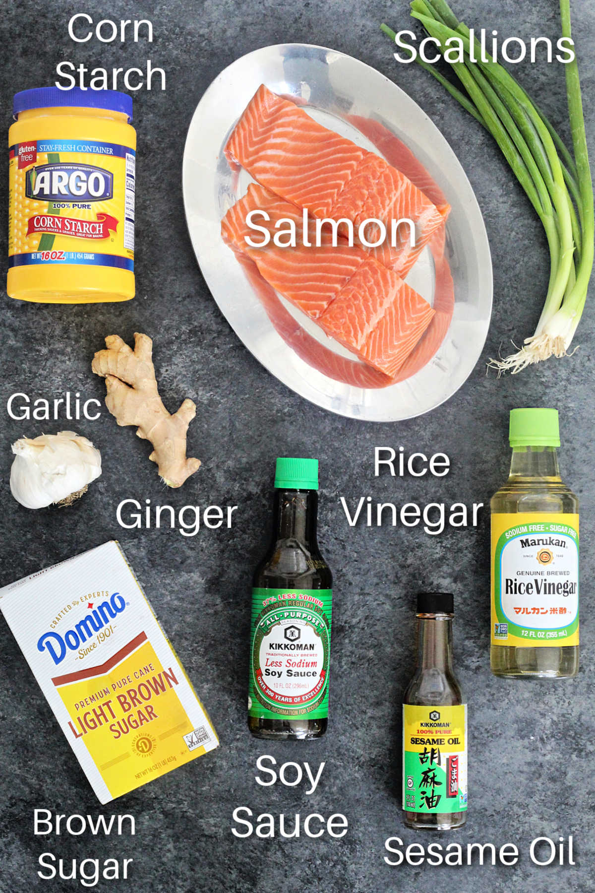 air fryer salmon teriyaki ingredients on a gray board.