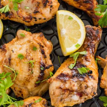 buttermilk grilled chicken with a lemon wedge