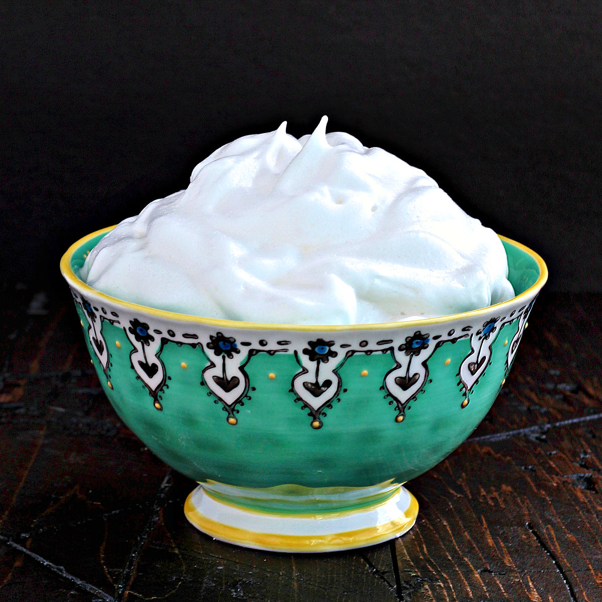 Aquafaba whipped cream in a bowl.