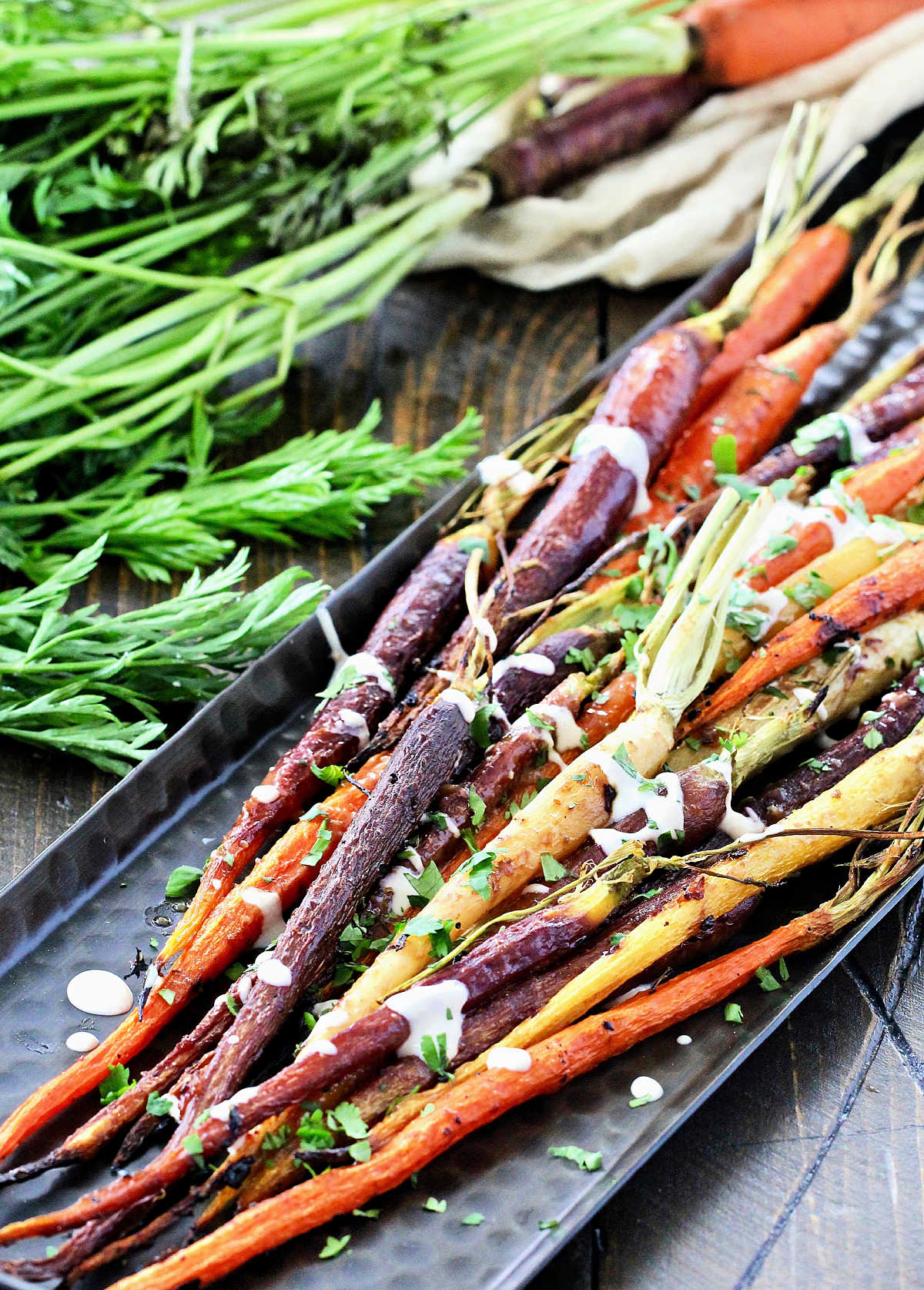Miso roasted carrots on a serving platter.