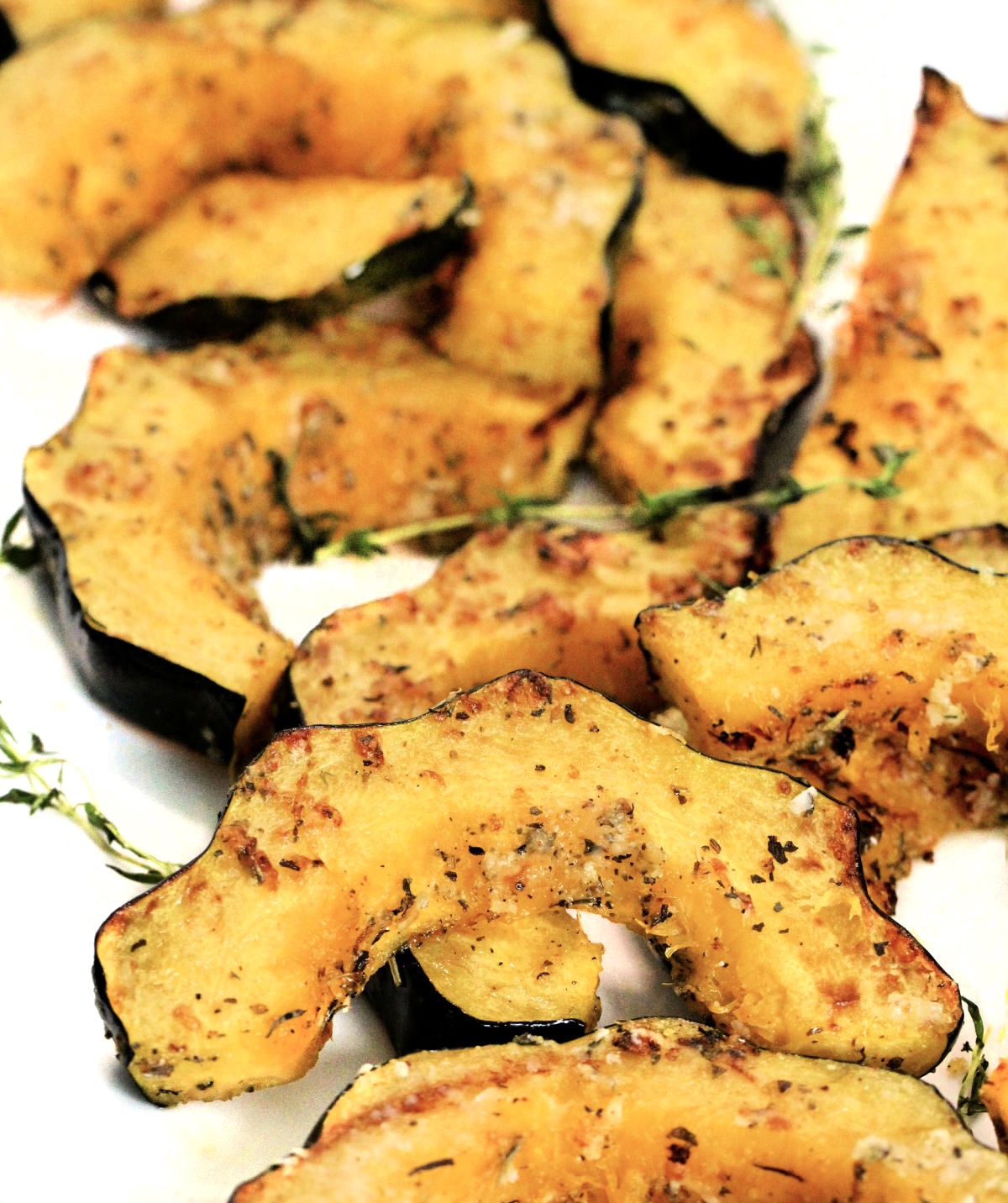 Air fryer corn squash slices on a plate. 